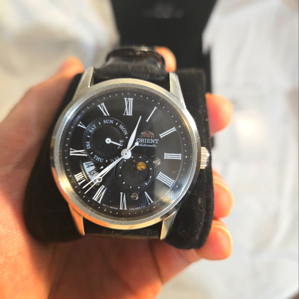 Orient automatic sun and moon day and date black dress watch